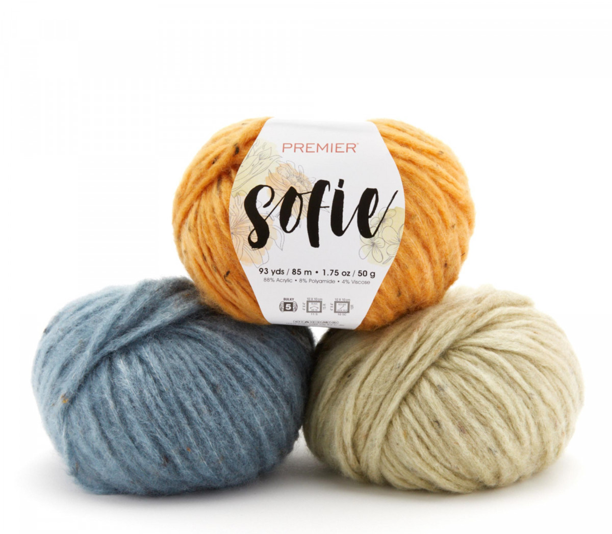 Product photography of three balls of Sofie yarn
